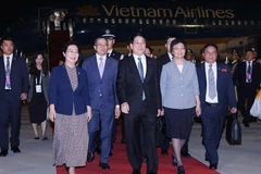 Le président Luong Cuong et une délégation vietnamienne de haut rang sont arrivés à Pékin le 2 septembre au soir. Photo : VNA