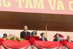 Dans l'atmosphère solennelle de la célébration, le secrétaire général du Parti, To Lam, a prononcé un discours au nom des dirigeants du Parti, de l'État et du Comité central du Front de la Patrie du Vietnam. Photo : VNA