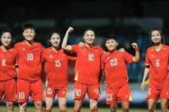 La joie des joueuses vietnamiennes après le premier but inscrit par Hai Yen (troisième en partant de la droite) à la 4e minute du match. (Photo : VNA)