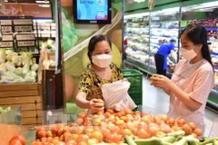 L'IPC vietnamien progresse de 1,14 % en février sous l'effet de la demande liée au Têt. Photo : VNA