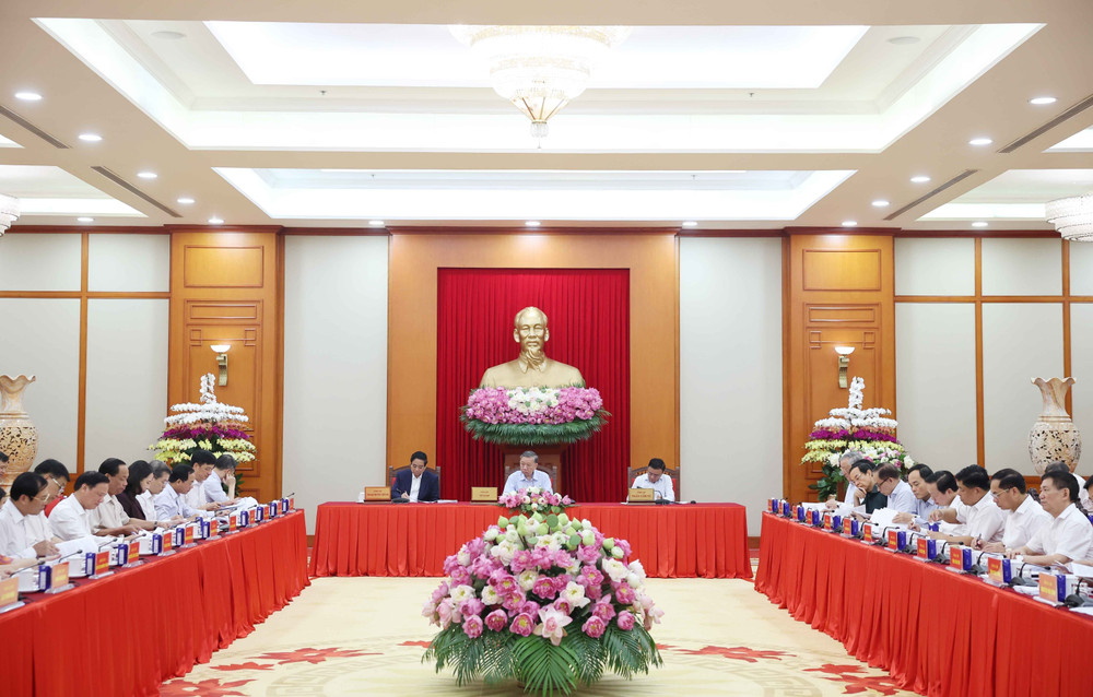 vna-potal-tong-bi-thu-to-lam-chu-tri-buoi-lam-viec-ve-du-thao-cac-van-kien-dai-hoi-xiv-cua-dang-115746399-8180185.jpg