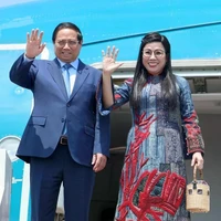 Le Premier ministre Pham Minh Chinh et son épouse. Photo : VNA
