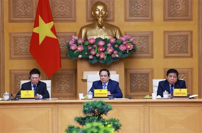 Le Premier ministre Pham Minh Chinh (centre) lors du dialogue avec le monde des affaires américain à Hanoi, le 13 mai. Photo : VNA pham-minh-chinh-entreprises-americaines-vna.jpg