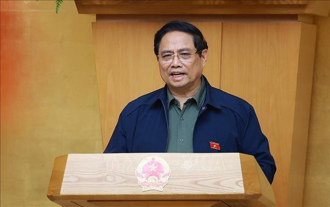 Le Premier ministre Pham Minh Chinh s'exprime lors de la réunion du gouvernement sur la situation du déploiement du modèle d’administration locale à deux niveaux. Photo: VNA le-premier-ministre-pham-minh-chinh.jpg
