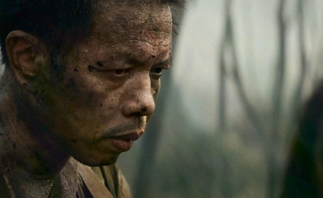 L’acteur Thai Hoa dans le rôle de Bay Theo. Photo : capture d’une scène du film "Dia dao" thai-hoa.jpg