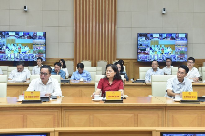 Les délégués participant à la réunion. Photo: VNA mai-van-chinh-delegues.jpg