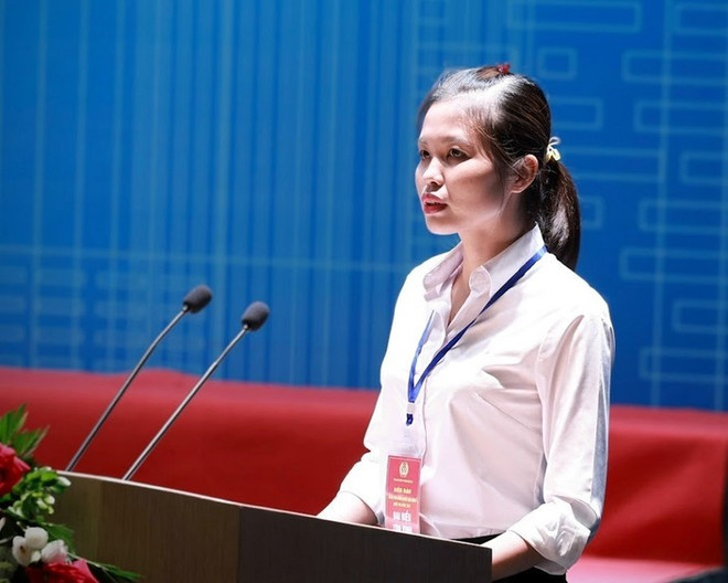 Phùng Thi Hanh, ouvrière dans une usine de Hanoï rattachée à la Compagnie de textile May 10. Photo: VGP phung-thi-hanh.jpg