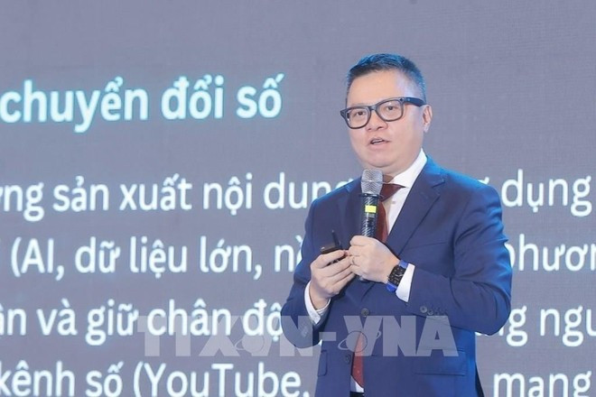 Lê Quôc Minh, vice-président de la Commission de la sensibilisation, de l’éducation et de la mobilisation des masses du Comité central du Parti, rédacteur en chef du journal Nhân Dân et président de l’AJV s’exprime lors du deuxième Forum national de la presse. Photo : VNA le-quoc-minh.jpg