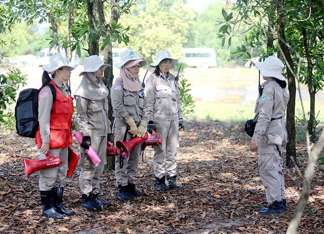 Les membres de l'équipe. Photo: cand.com.vn membres-de-lequipe.jpg