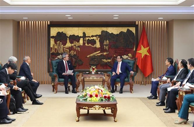 Le Premier ministre Pham Minh Chinh (à gauche) recevant le PDG de Marubeni Corporation, Masayuki Omoto, à Hanoi, le 14 juillet. Photo : VNA pham-minh-chinh-masayuki-omoto-vna.jpg
