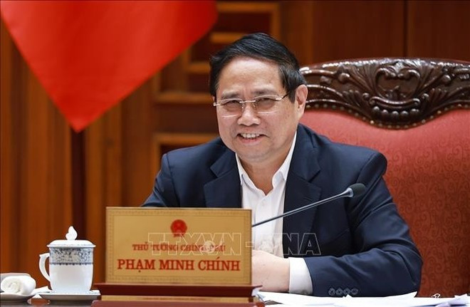 Le Premier ministre Pham Minh Chinh lors de la réunion, à Hanoi, le 1er juillet. Photo : VNA comite-du-parti-du-gouvernement-pmc.jpg