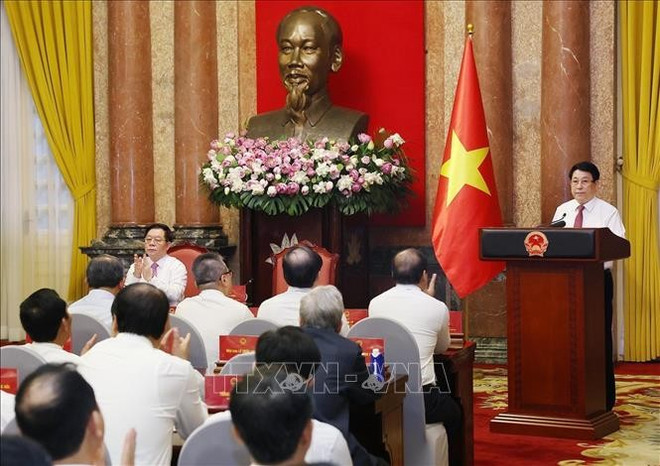 Le président Luong Cuong s’exprime lors de la rencontre, à Hanoi, le 20 juin. Photo : VNA luong-cuong-presse.jpg