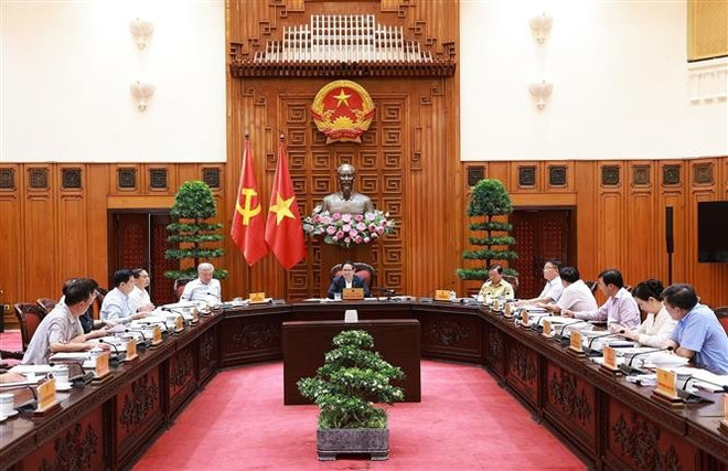 Vue d'ensemble de la réunion, à Hanoi, le 1er juillet. Photo: VNA pham-minh-chinh-projet-de-plan-de-promotion-culturelle.jpg