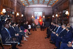 To Lam reçoit une délégation de députés de la Chambre des représentants des États-Unis. Photo : VNA