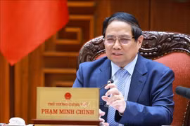 Le Premier ministre Pham Minh Chinh demande d'accélérer la construction de l'autoroute Chau Doc-Can Tho-Soc Trang. Photo : VNA