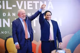 Le Premier ministre vietnamien Pham Minh Chinh (droite) et le président brésilien Luiz Inácio Lula da Silva ont participé ce samedi 29 mars au Forum économique Brésil-Vietnam. Photo : VNA