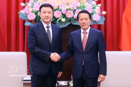 Le général Luong Tam Quang (droite), ministre vietnamien de la Sécurité publique, et le ministre chinois de la Sécurité publique, Wang Xiaohong. Photo: VNA