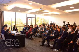 Des délégués assistent à la conférence de promotion de l’investissement. Photo: VNA