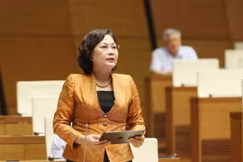 La gouverneure de la Banque d'État, Nguyên Thi Hông, lors de la séance de questions-réponses à la 9e session de la 15e Assemblée nationale, le 19 juin à Hanoï. Photo: VNA