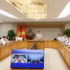 La quatrième réunion du Conseil exécutif du Centre financier international du Vietnam, tenue le 22 octobre à Hanoï. Photo: VNA