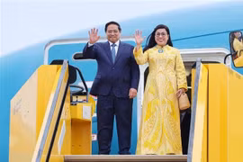 Le Premier ministre Pham Minh Chinh et son épouse. Photo: VNA
