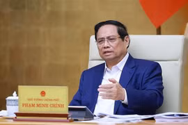 Le Premier ministre Pham Minh Chinh lors de la réunion. Photo: VNA