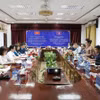 Lors de l’entretien entre les délégations de la province vietnamienne de Diên Biên et de la province lao de Bokeo. Photo : VNA