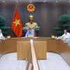 Le Premier ministre Lê Minh Hung (au centre) préside la réunion visant à faire le point sur la mise en œuvre des projets de transport clés et à accélérer leur décaissement de fonds, à Hanoi, le 22 septembre. Photo : VNA