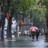 Un coin du lac Hoàn Kiêm à Hanoï par temps de pluie. Photo: VNA