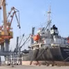 Manutention de marchandises au port de Hoang Dieu - Chua Ve.