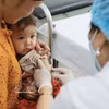 La vaccination a protégé des millions d'enfants vietnamiens contre de nombreux types de maladies. Photo : VNA