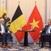 Le secrétaire général du Parti et président vietnamien, To Lam (droite), a rencontré le 23 octobre le ministre-président du Gouvernement flamand, Matthias Diependaele. Photo : VNA