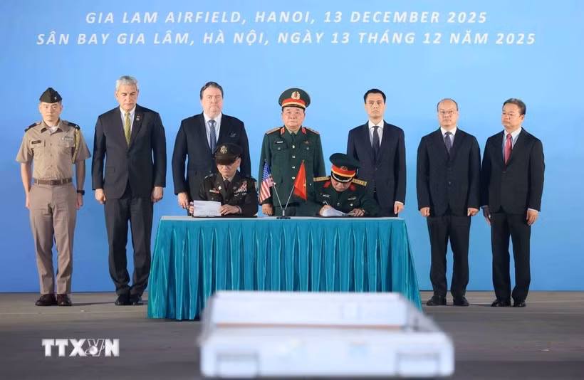 Cérémonie de signature pour le 171e rapatriement des ossements de militaires américains. Photo: VNA