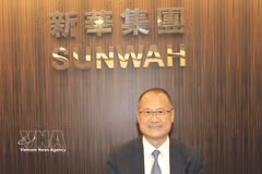 Le Dr Jonathan Choi, président du groupe hongkongais Sunwah, président de la Chambre générale de commerce chinoise de Hong Kong et président du groupe vietnamien VinaCapital. Photo: VNA