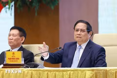 Le Premier ministre Pham Minh Chinh s’exprime lors d’une conférence avec les entreprises publiques à Hanoï le 15 avril. Photo : VNA