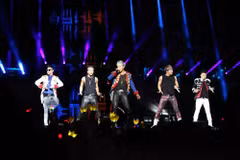 Les membres du groupe Big Bang donneront deux concerts au stade national My Dinh, à Hanoi, les 24 et 25 octobre 2026. Photo : thethaovanhoa.vn