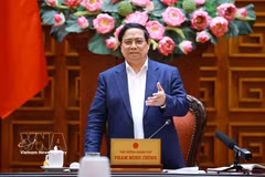Le Premier ministre Pham Minh Chinh s'exprime lors de la réunion du 10 mars. Photo: VNA