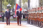Cérémonie d’accueil officielle du président Luong Cuong en visite d’État au Laos. Photo: VNA