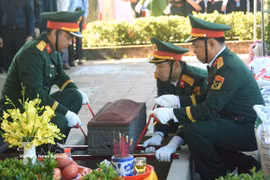 Cérémonie d’inhumation des restes de soldats morts pour la Patrie à Quang Tri. Photo: VNA