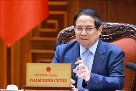 Le Premier ministre Pham Minh Chinh demande d'accélérer la construction de l'autoroute Chau Doc-Can Tho-Soc Trang. Photo : VNA 