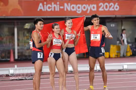 Les athlètes Le Ngoc Phuc, Nguyen Thi Ngoc, Quach Thi Lan et Ta Ngoc Tuong terminent troisièmes, derrière Bahreïn et l’Inde, dans l’épreuve du relais mixte 4x400 m, offrant à l’athlétisme vietnamien sa première médaille de bronze à ces Jeux. Photo: Xinhua/VNA