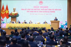 Le Premier ministre Pham Minh Chinh s'exprime lors de la conférence. Photo: VNA