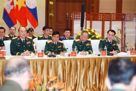 Rencontre des ministres de la Défense du Vietnam, du Laos et du Cambodge à Hanoï. Photo: VNA