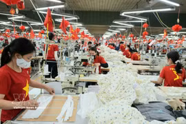 Le secteur de textille-habillement vise 48 milliards de dollars d'exportations cette année. Photo : VNA