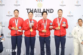 Les athlètes Nguyen Thi Phuong, Nguyen Ngoc Tram, Bui Ngoc Nhi et Hoang Thi Thu Uyen ont remporté la médaille d'or dans l'épreuve de Kata par équipe féminine. (Photo : VNA)