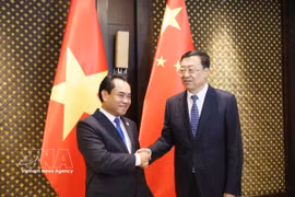 Le ministre de l'Agriculture et de l'Environnement, Trinh Viet Hung (à gauche) et le ministre chinois de l'Agriculture et des Affaires rurales, Zhang Zhu. Photo : VNA