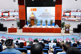 La conférence est retransmise en visioconférence vers des points de connexion installés dans les quartiers de Hô Chi Minh-Ville. Photo : VNA