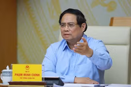 Le Premier ministre Pham Minh Chinh lors de la réunon. Photo : VNA