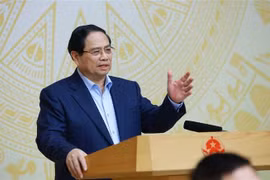 Le Premier ministre Pham Minh Chinh; chef du Comité directeur national chargé de la mise en œuvre de la Résolution n°79-NQ/TW du Bureau politique sur le développement de l’économie publique. Photo : VNA