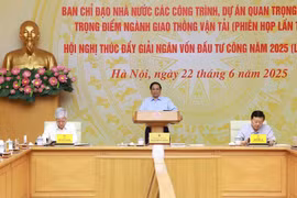 Le Premier ministre Pham Minh Chinh préside la téléconférence nationale le 22 juin. (Photo : VNA)